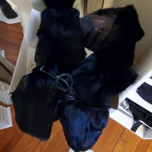 Black coach fur vest